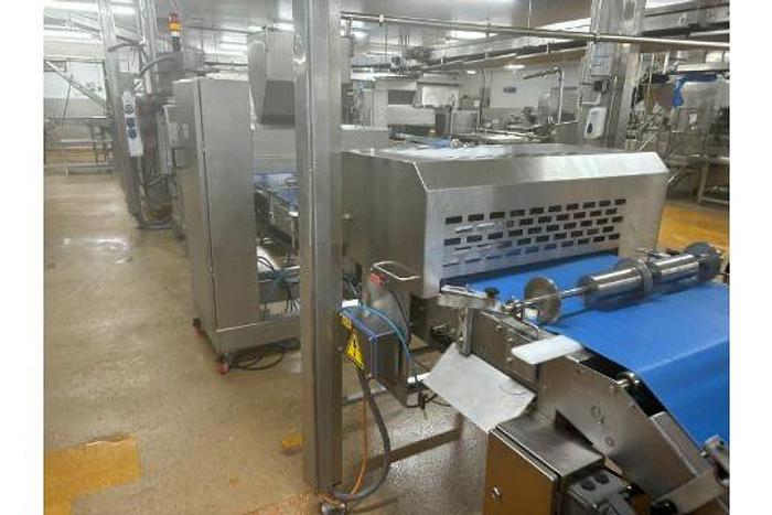 Used TROMP LINE 1x Tromp line comprising of main line pastry cutting marking discs, burgess calibrator with 2 flour dusters, rondo marker, cutter unit, hand crimped cutter and sensor, tromp depositor with stairs, rondo guillotine and cutters and dockers, portable scrap pastry unit, wire belt take off conveyor, 3 chain take off conveyor, hugging conveyor, topping machine with stand, 6 lane forming box, product divider, 2 off drum pastry cutters (foils) 1 off marker unit (chevron) Main panel Tromp (office), Main Panel Rondo, HMI Panel Tromp, HMI panel rondo, 3 off single step stands.. Located Wiltshire. UKFM4-6314 Lift out £2500