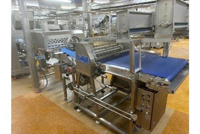 Used TROMP LINE 1x Tromp line comprising of main line pastry cutting marking discs, burgess calibrator with 2 flour dusters, rondo marker, cutter unit, hand crimped cutter and sensor, tromp depositor with stairs, rondo guillotine and cutters and dockers, portable scrap pastry unit, wire belt take off conveyor, 3 chain take off conveyor, hugging conveyor, topping machine with stand, 6 lane forming box, product divider, 2 off drum pastry cutters (foils) 1 off marker unit (chevron) Main panel Tromp (office), Main Panel Rondo, HMI Panel Tromp, HMI panel rondo, 3 off single step stands.. Located Wiltshire. UKFM4-6314 Lift out £2500