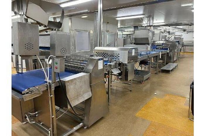 Used TROMP LINE 1x Tromp line comprising of main line pastry cutting marking discs, burgess calibrator with 2 flour dusters, rondo marker, cutter unit, hand crimped cutter and sensor, tromp depositor with stairs, rondo guillotine and cutters and dockers, portable scrap pastry unit, wire belt take off conveyor, 3 chain take off conveyor, hugging conveyor, topping machine with stand, 6 lane forming box, product divider, 2 off drum pastry cutters (foils) 1 off marker unit (chevron) Main panel Tromp (office), Main Panel Rondo, HMI Panel Tromp, HMI panel rondo, 3 off single step stands.. Located Wiltshire. UKFM4-6314 Lift out £2500