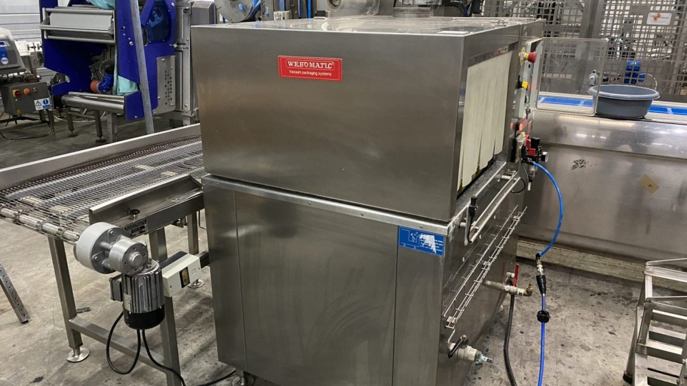 Used Webomatic vacuum line