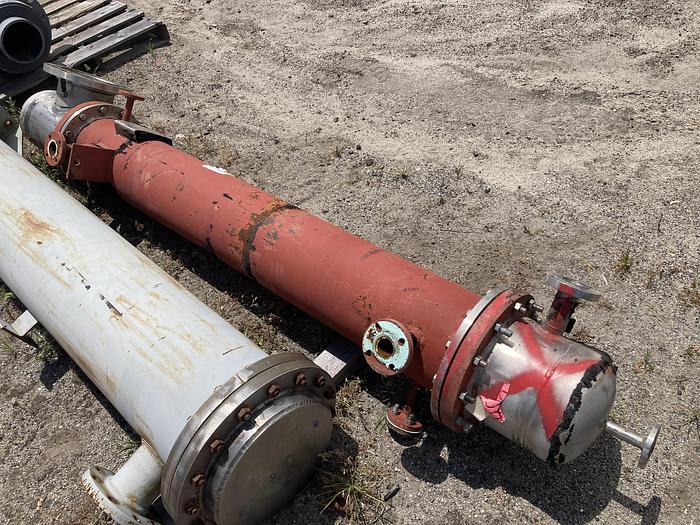 Used Used Rubicon Industries vertical approximately 100 square foot 304 stainless steel shell and tube Heat Exchanger