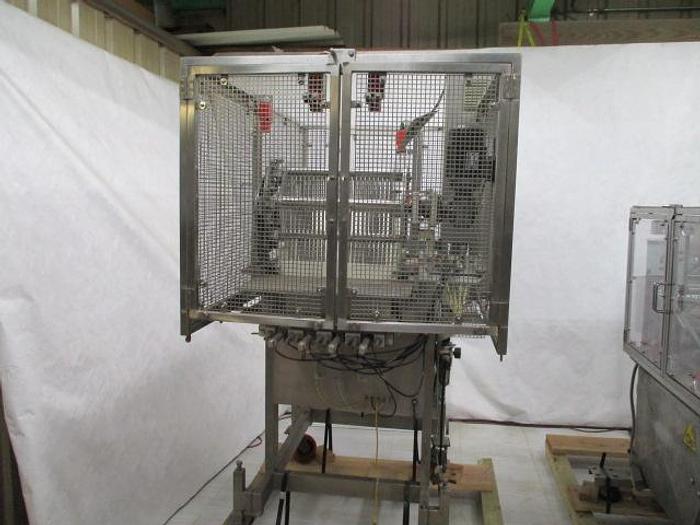 Used Mondini Cup Filling & Sealing Line for Solids ans Liquids