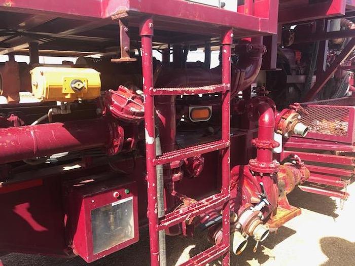 Used 2010 Stewart and Stevenson Single Pump trailer with mixing system.