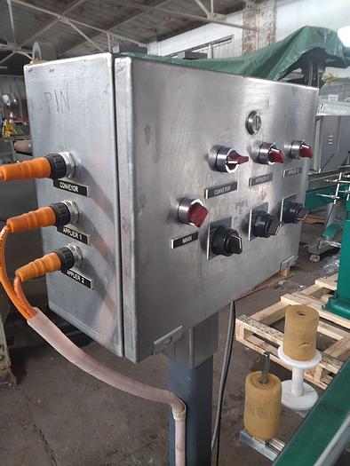 Used Universal Front and Back labeler  2" strippers