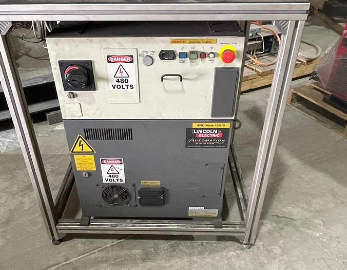 Used FANUC ARCMATE 120iC/10L MIG WELDING CELL WITH 2 AXIS 10' LONG DROP CENTER TRUNNION W/ROTARY CNC TABLE