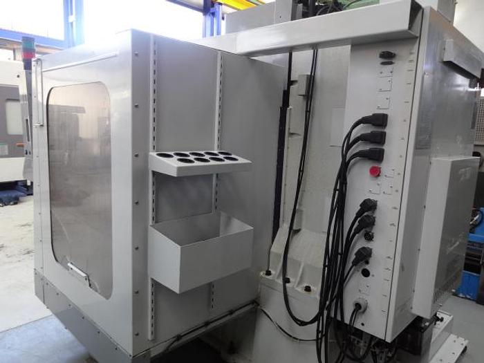 Utilisé Centre d’usinage vertical 3 axes Marque MIKRON – HAAS