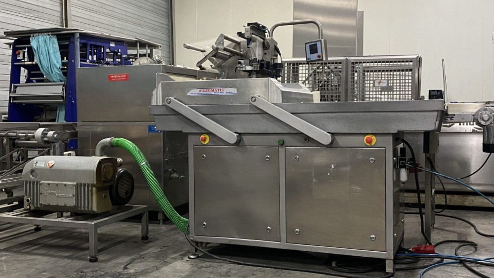 Used Webomatic vacuum line