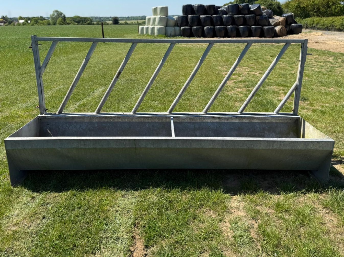 Used Cattle Feed Trough and Barrier