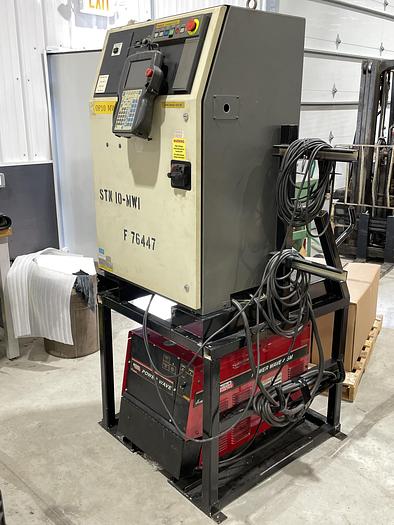 Used FANUC FANUC ARC MATE 120iB MIG WELDING CELL WITH LINCOLN 455M AND INDEX TABLE 5' X 8' RJ3iB CONTROL