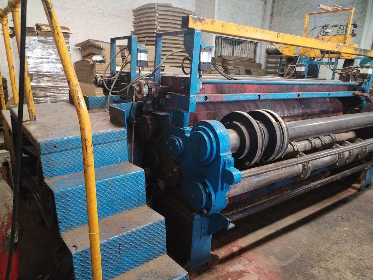 Used 52" x 122" Langston 2 color Printer Slotter, Kicker feed table, Sheet Stacker, in operation