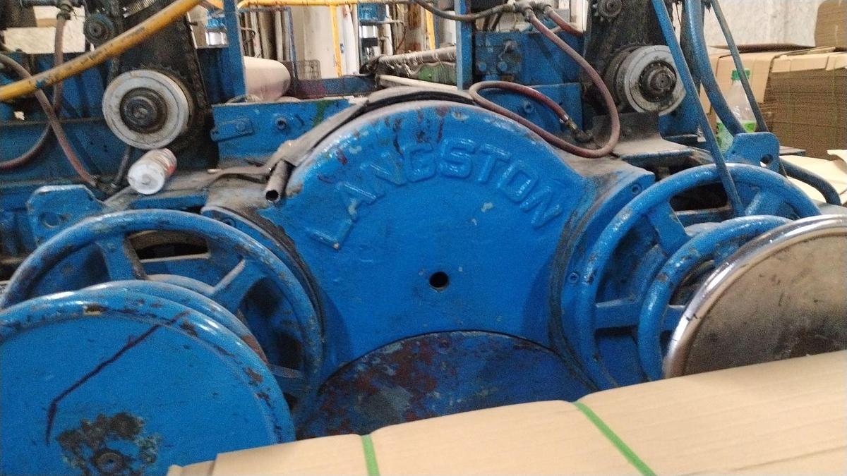 Used 52" x 122" Langston 2 color Printer Slotter, Kicker feed table, Sheet Stacker, in operation