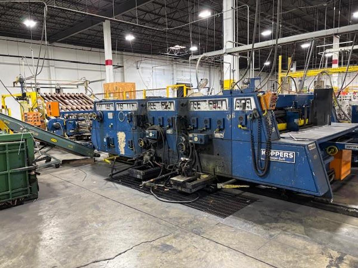 Used 66" x 115" Koppers 2 color Rotary Die Cutter with Slotting section