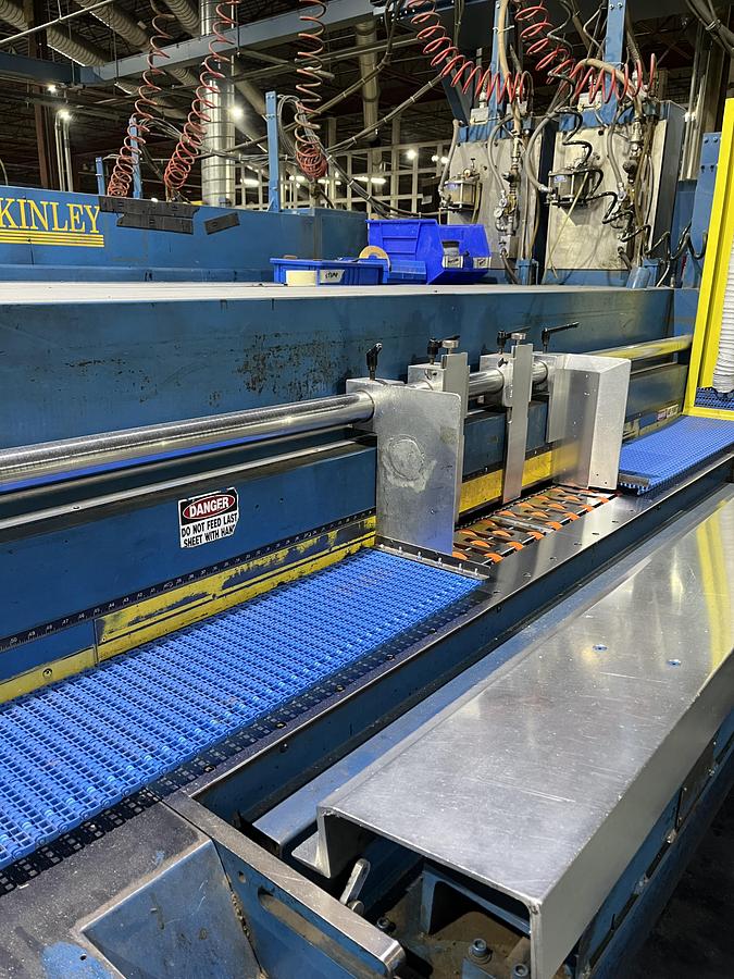 Used 50" x 130" McKinley 2 color Flexo Folder Gluer with die cut section