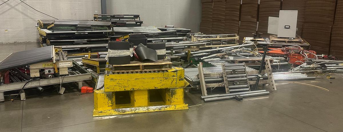 Used Powered conveyor for sale 150' with forklift pickups and chain transfers