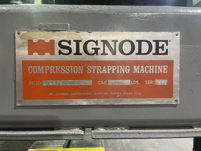 Used Signode 2 head Unitizer,  in operation