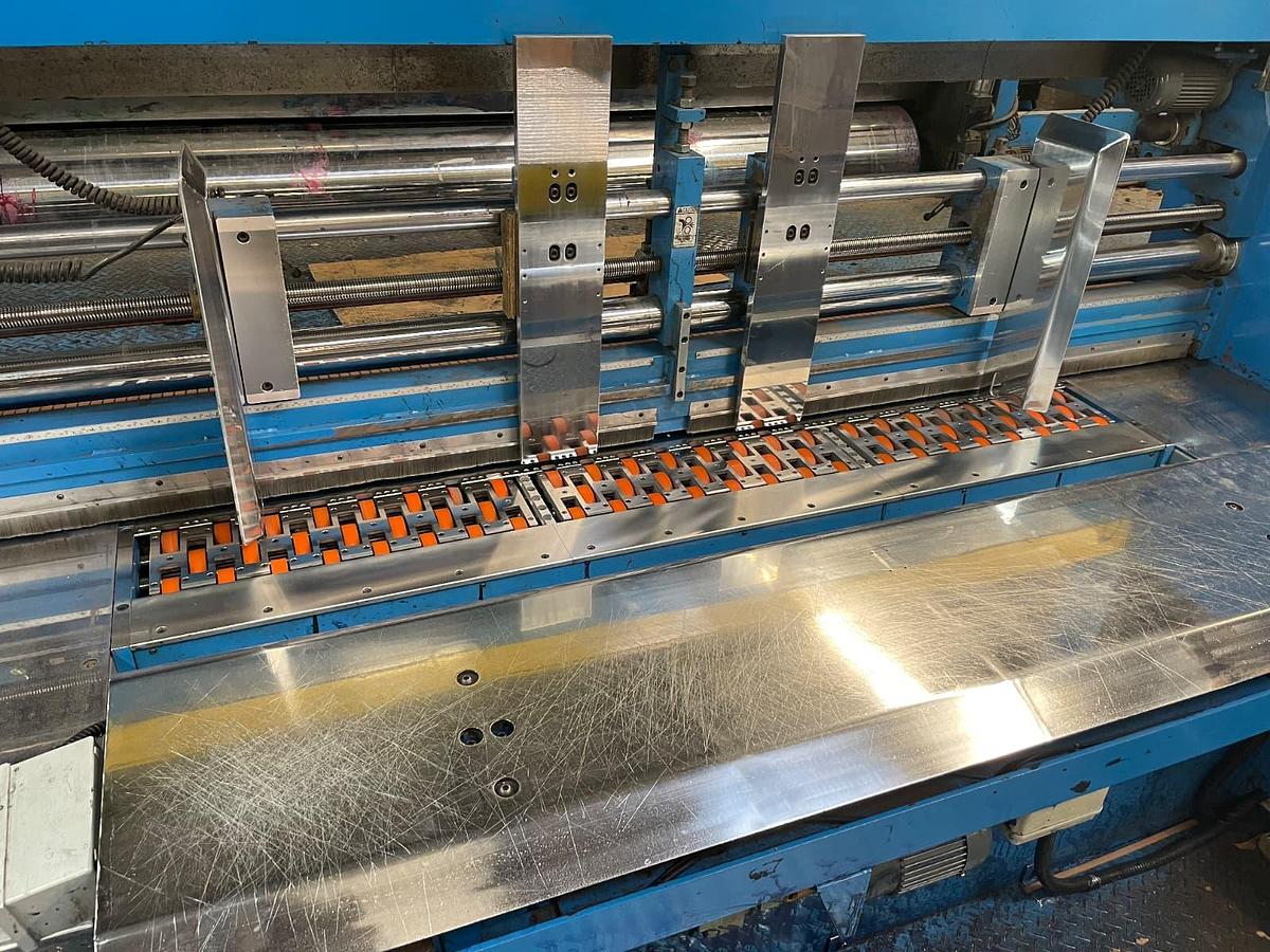 Used Latitude 50"x110 with Die Cut Section, Motorized Slotting Heads, Vacuum Transfer. 2008 Machine In Operation