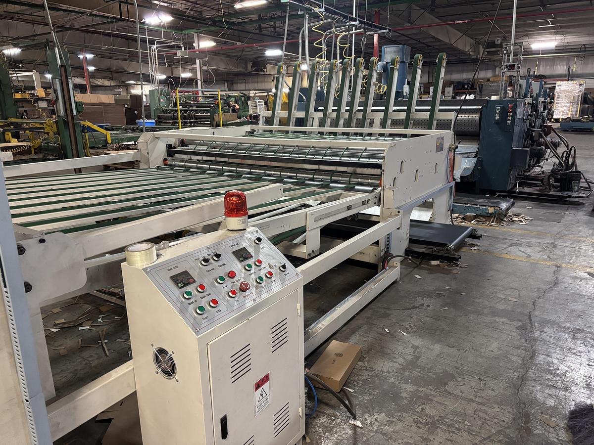 Used 66″ x 110″ MckInley 2 color Rotary Die Cutter