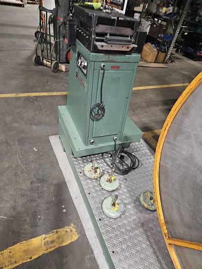 Used 4" Stock Leveler with double adjustable payoff reels stock feed press side