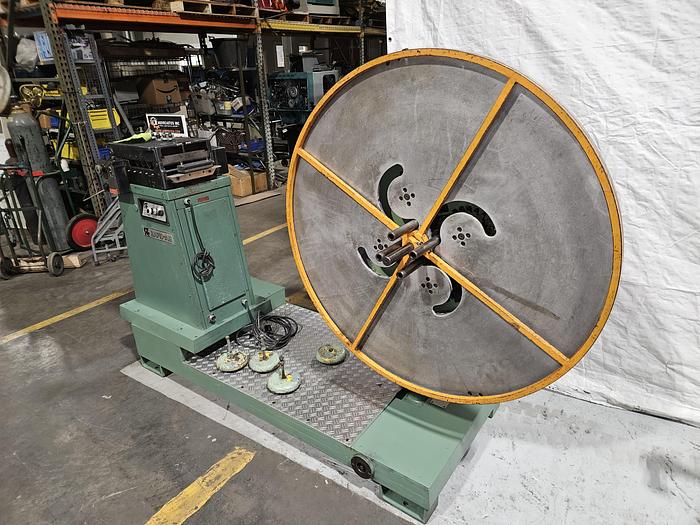 Used 4" Stock Leveler with double adjustable payoff reels stock feed press side