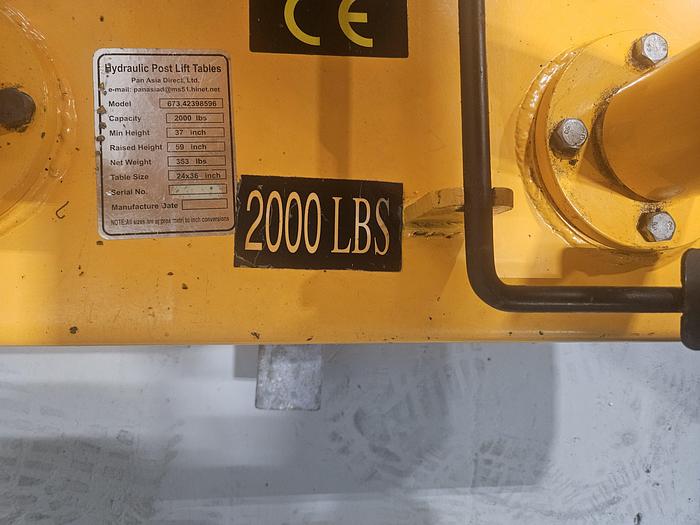 Used Hydraulic Post Lift Table 2000 Lb Capacity 59 Inch Raised Height Table is 24x36 Inch 