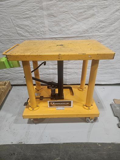 Used Hydraulic Post Lift Table 2000 Lb Capacity 59 Inch Raised Height Table is 24x36 Inch 