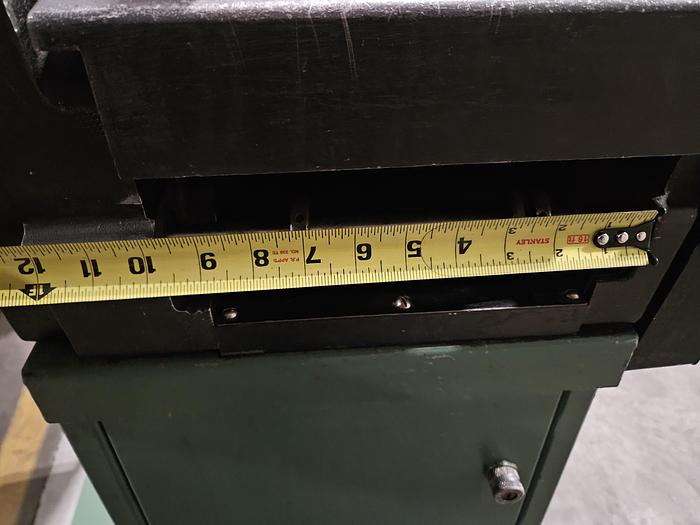 Used 4" Stock Leveler with double adjustable payoff reels stock feed press side