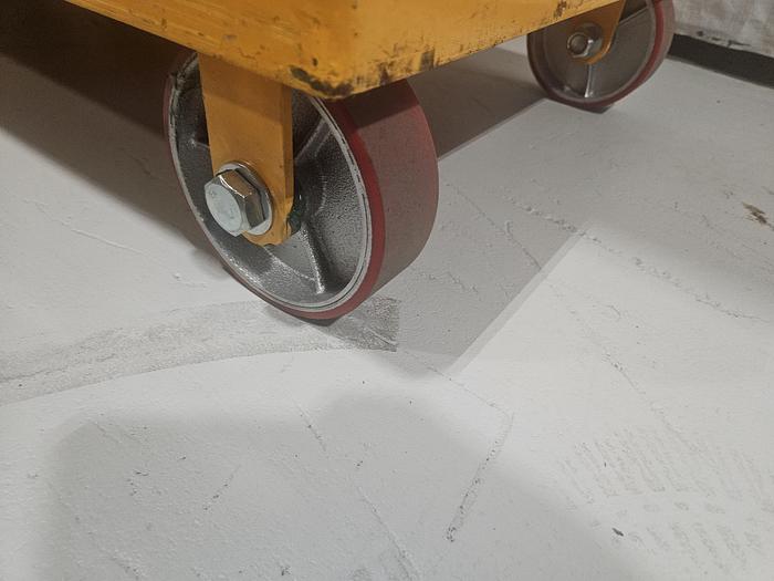 Used Hydraulic Post Lift Table 2000 Lb Capacity 59 Inch Raised Height Table is 24x36 Inch 