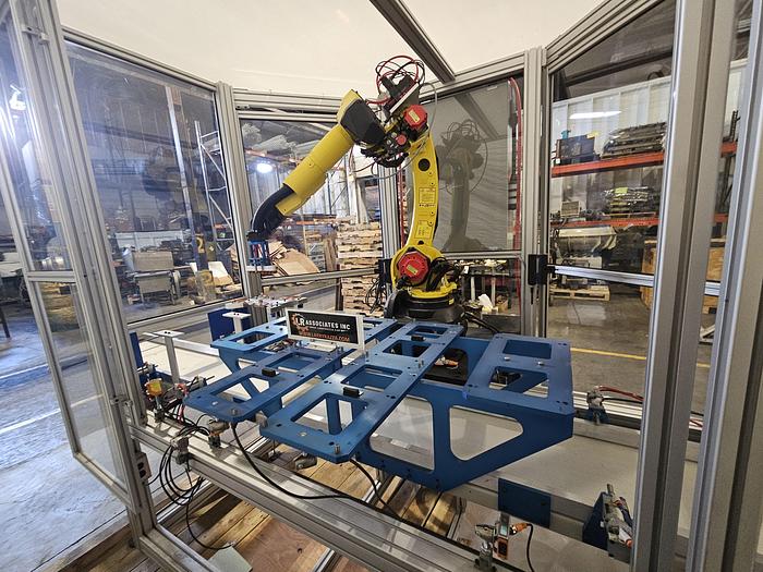 Used  AES Robotic Custom Packaging Machine Automated Robot Packaging with Conveyor