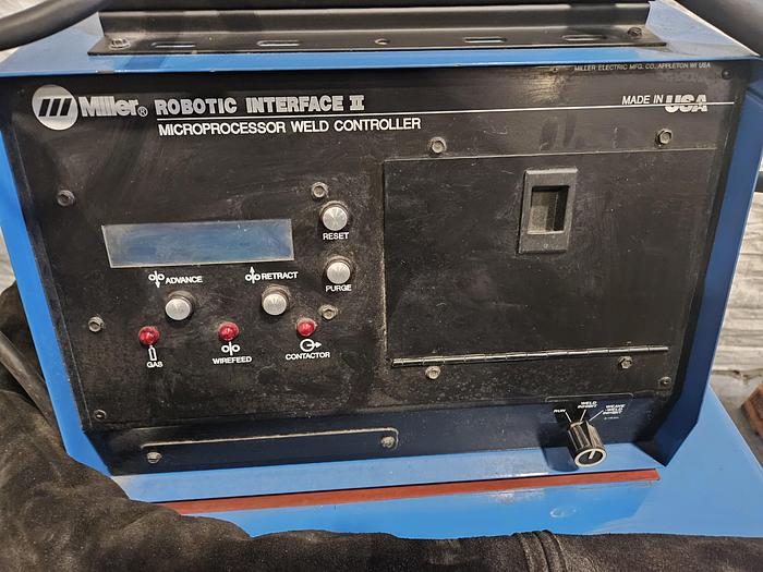 Used Miller Delta Weld 452 CV DC Welding Power Source with Miller Robotic Interface Microprocessor Weld Controller Cool mate 4 & Gun w/ Feeder... formerly on a Robot Welder