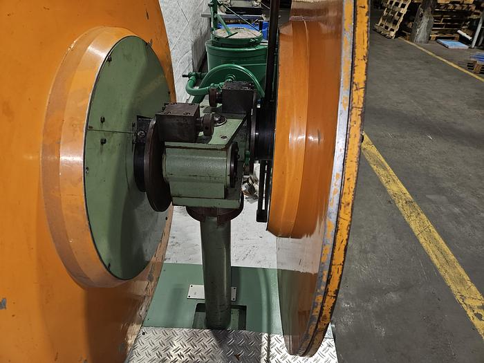 Used 4" Stock Leveler with double adjustable payoff reels stock feed press side