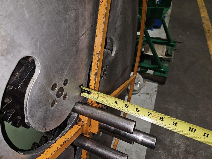 Used 4" Stock Leveler with double adjustable payoff reels stock feed press side