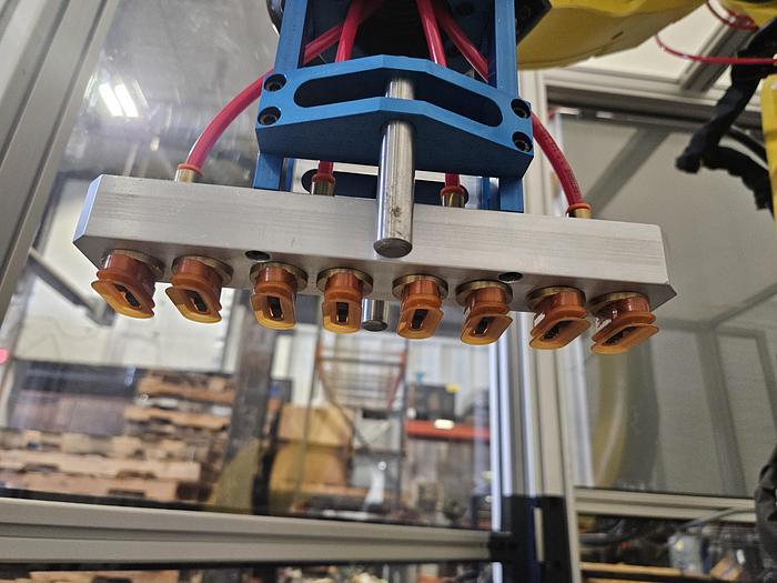 Used  AES Robotic Custom Packaging Machine Automated Robot Packaging with Conveyor