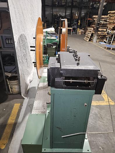 Used 4" Stock Leveler with double adjustable payoff reels stock feed press side