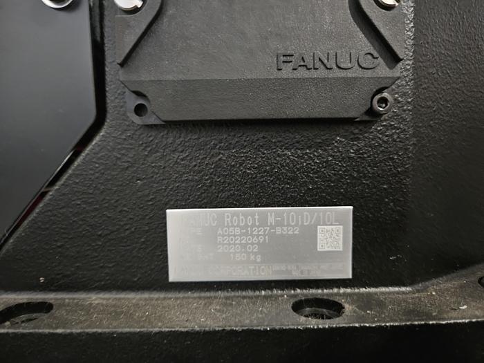 Used  AES Robotic Custom Packaging Machine Automated Robot Packaging with Conveyor