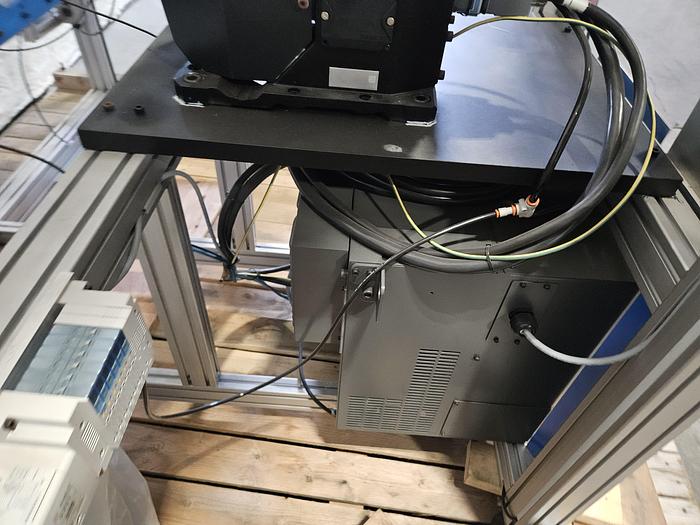 Used  AES Robotic Custom Packaging Machine Automated Robot Packaging with Conveyor