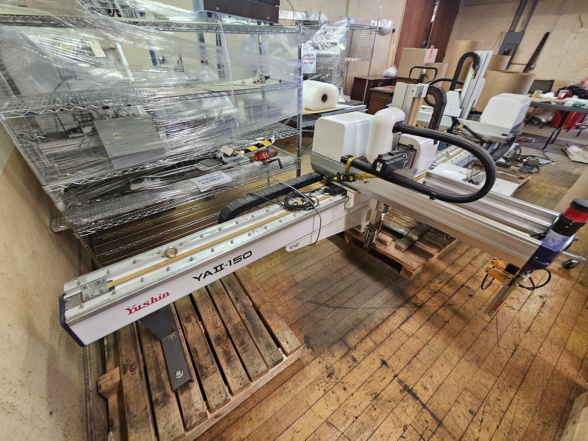 Used Yushin Robot for Injection Molding Machines