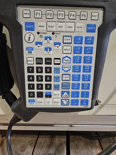 Used  AES Robotic Custom Packaging Machine Automated Robot Packaging with Conveyor