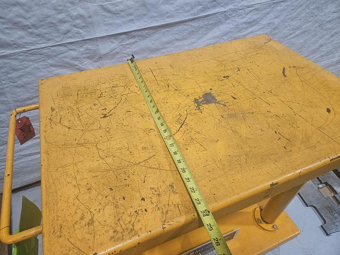 Used Hydraulic Post Lift Table 2000 Lb Capacity 59 Inch Raised Height Table is 24x36 Inch 