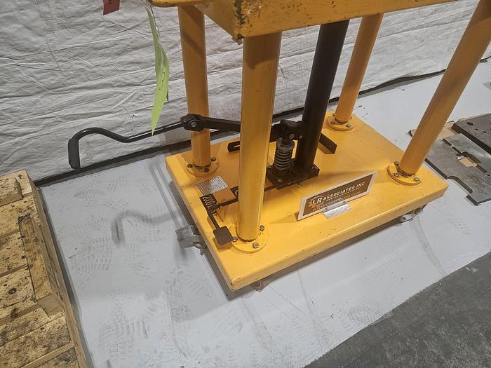 Used Hydraulic Post Lift Table 2000 Lb Capacity 59 Inch Raised Height Table is 24x36 Inch 