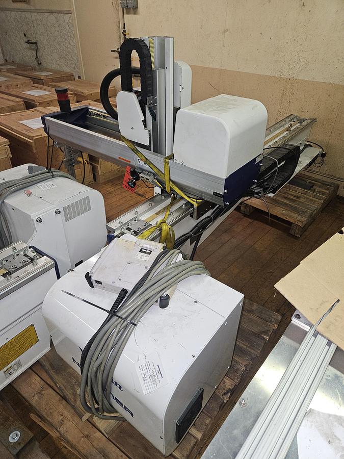 Used Yushin Robot for Injection Molding Machines