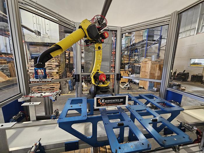 Used  AES Robotic Custom Packaging Machine Automated Robot Packaging with Conveyor