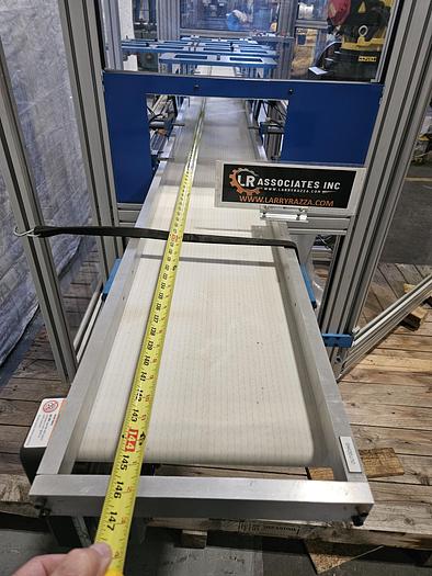 Used  AES Robotic Custom Packaging Machine Automated Robot Packaging with Conveyor