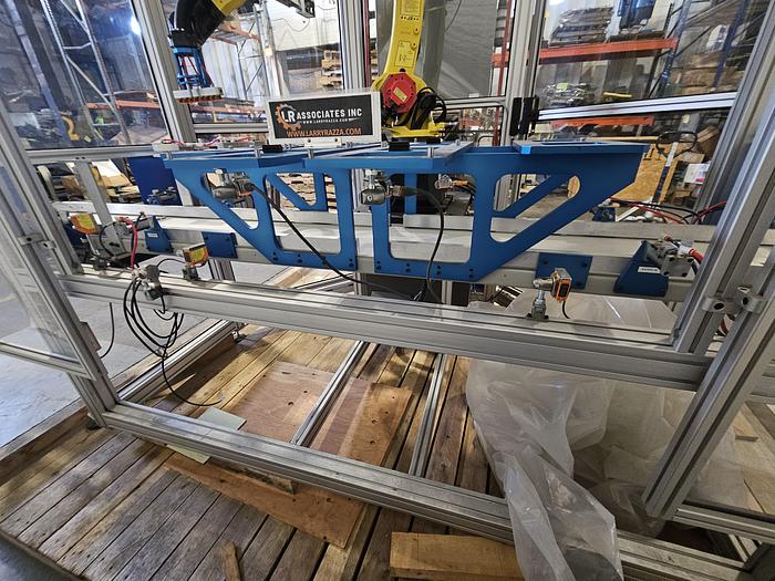 Used  AES Robotic Custom Packaging Machine Automated Robot Packaging with Conveyor