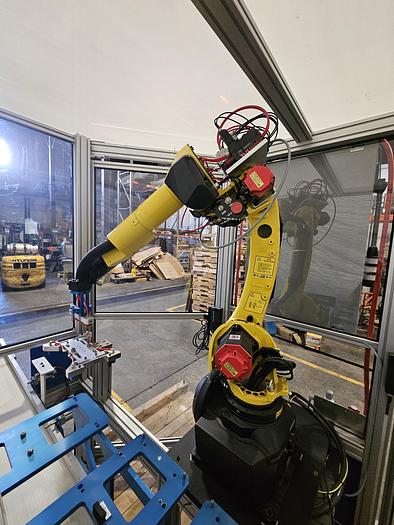 Used  AES Robotic Custom Packaging Machine Automated Robot Packaging with Conveyor