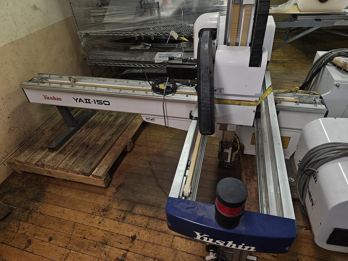 Used Yushin Robot for Injection Molding Machines