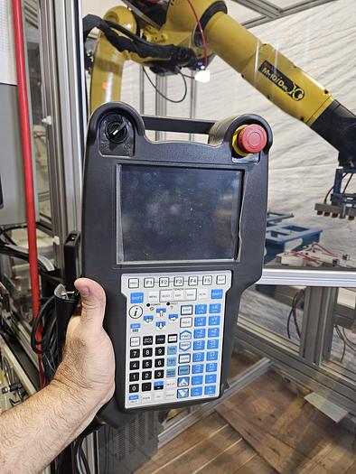 Used  AES Robotic Custom Packaging Machine Automated Robot Packaging with Conveyor