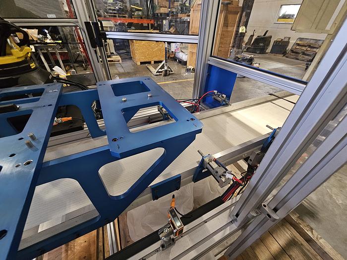 Used  AES Robotic Custom Packaging Machine Automated Robot Packaging with Conveyor