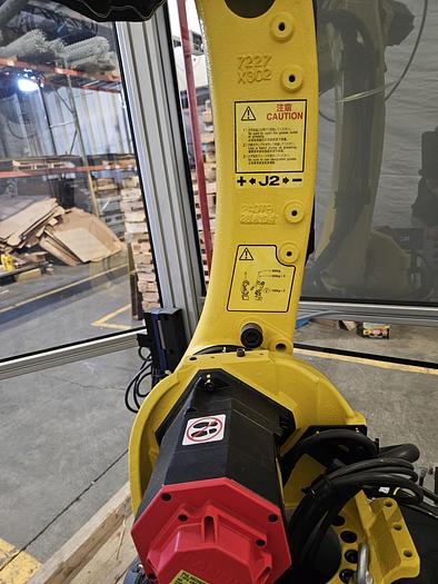 Used  AES Robotic Custom Packaging Machine Automated Robot Packaging with Conveyor