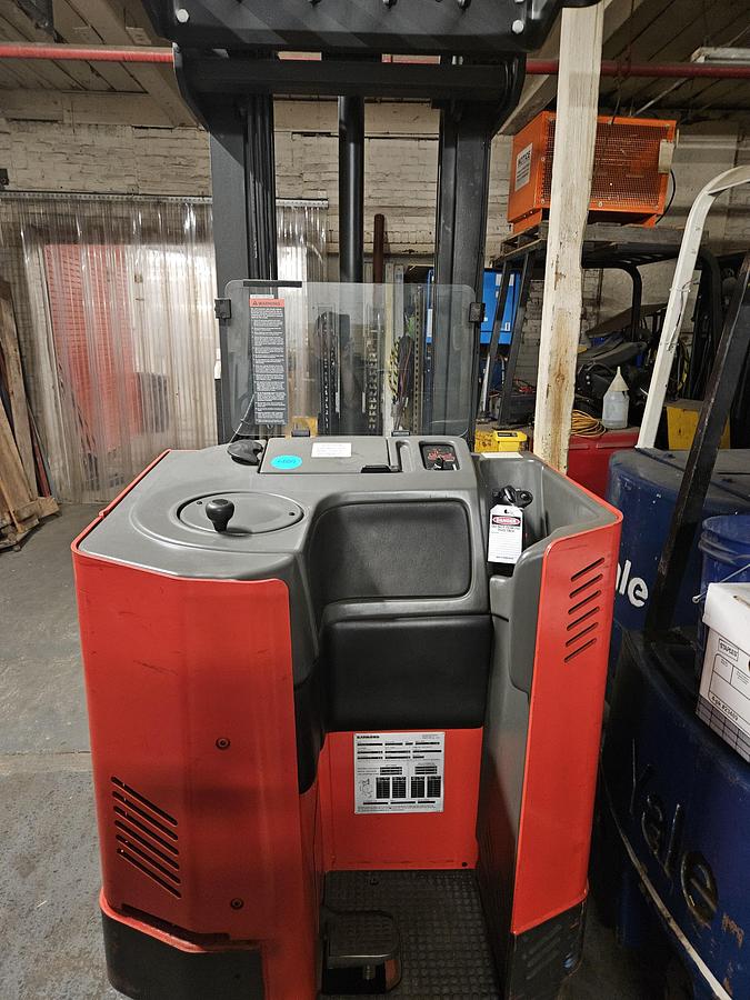 Used Raymond Standup Fork Lift 2007 Narrow Aisle 3000 Lb Triple Mast 260" height with Reaching Forks Forklift