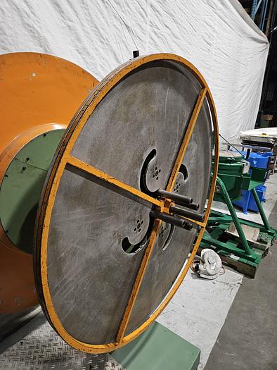 Used 4" Stock Leveler with double adjustable payoff reels stock feed press side